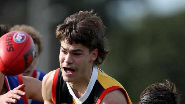 Will Bravo gets away a handball for the Stingrays in 2019.