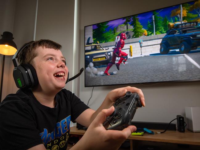 Will ,10 Playing computer games at home.PARENTS should protect their video-gaming kids online by disabling voice chats, installing passwords for in-game spending and dialling down the gore. With many kids in isolation spending more time than usual playing games such as FIFA, Fortnight and Final Fantasy, experts advise parents to be vigilant. Picture: Jason Edwards