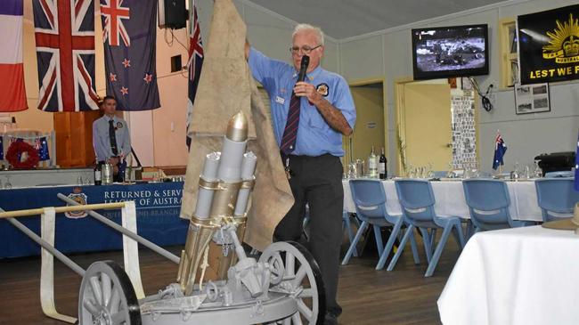 RSL Roma Sub-Branch President George Mehay unveiling a restored WW1 War trophy German mortar. Picture: James Liveris