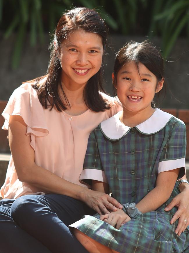 Angela Yip with her Year 4 daughter Sophia Wong, 9, at Holy Family Catholic Primary School in Lindfield. Picture: Brett Costello