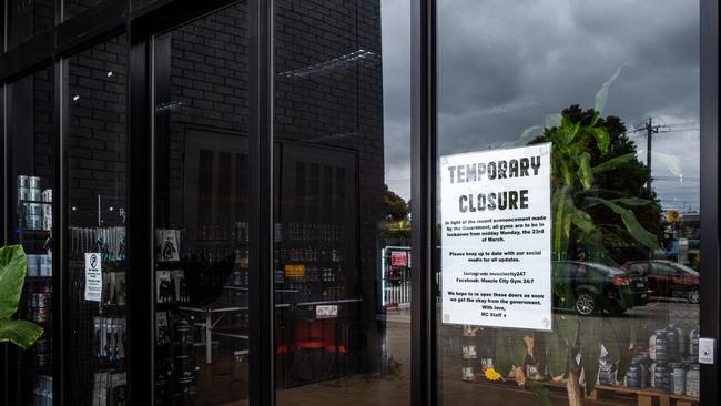 A sign at the front of The Muscle City Gym in Mount Waverley advising of its temporary closure. Picture: Asanka Ratnayake/Getty Images