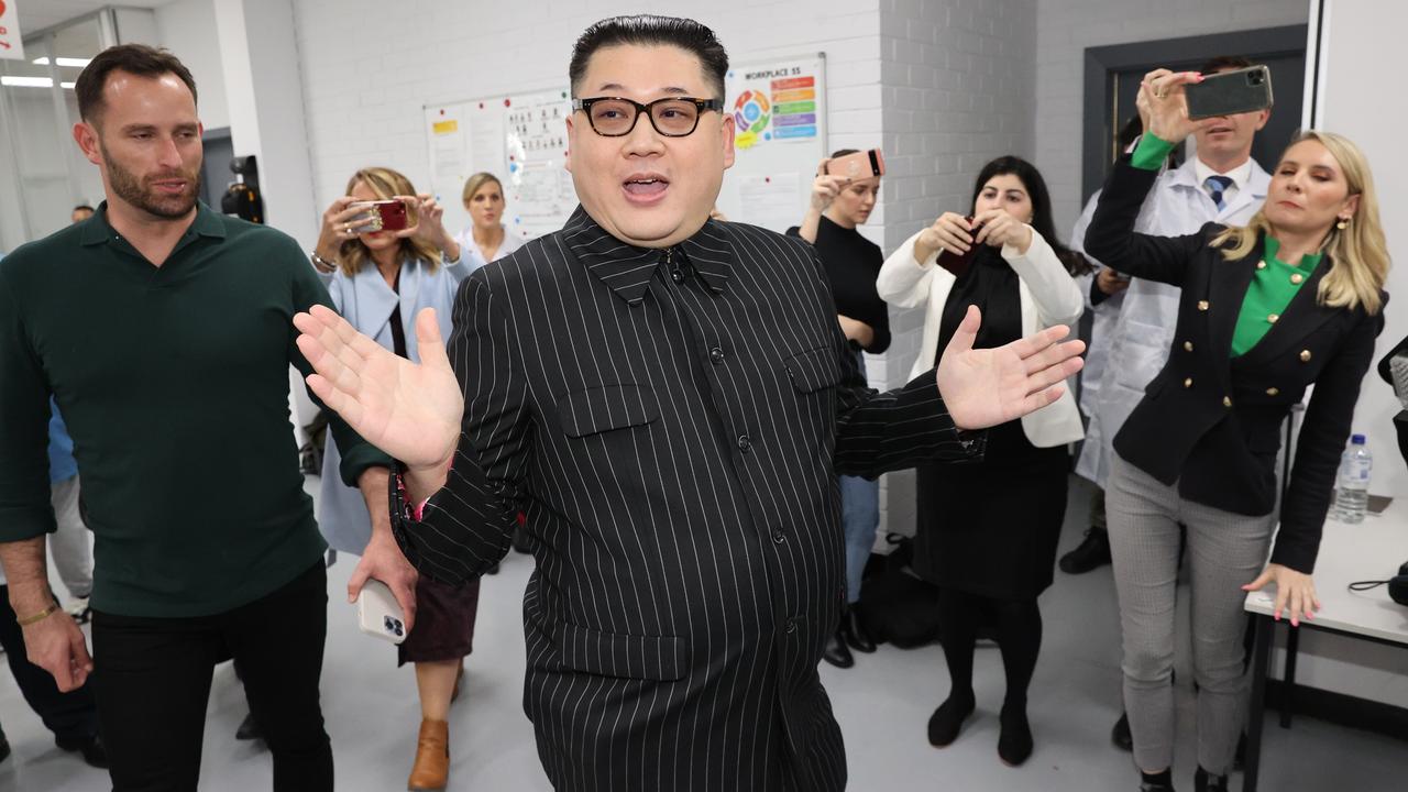 A man calling himself the Supreme Leader and dressed as North Korean leader Kim Jong-un pushed his way into a Scott Morrison campaign event in Melbourne. Picture: Jason Edwards