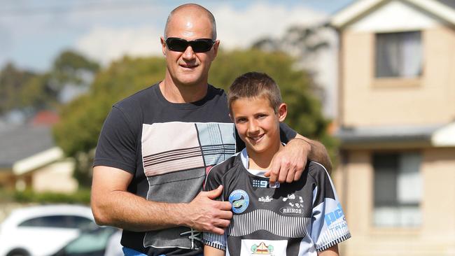 Coach Brad Arthur with son Jakob, whose NRL debut has been a long time coming.