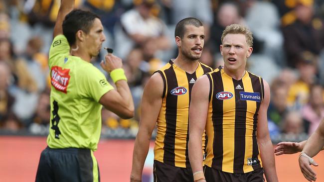 Hawthorn’s James Sicily looks at umpire Justin Power. Picture: Michael Klein.