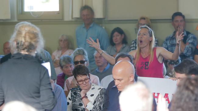 A Westbury resident gives Corrections Minister Elise Archer a serve at the community meeting against the proposed prison. Picture: PATRICK GEE