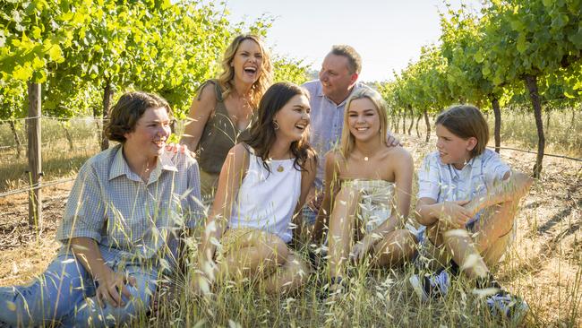 Vicki and Jeff Dewar on their Willow Bridge vineyard with children, from left, Cameron, Adele, Luisa and Kyle.