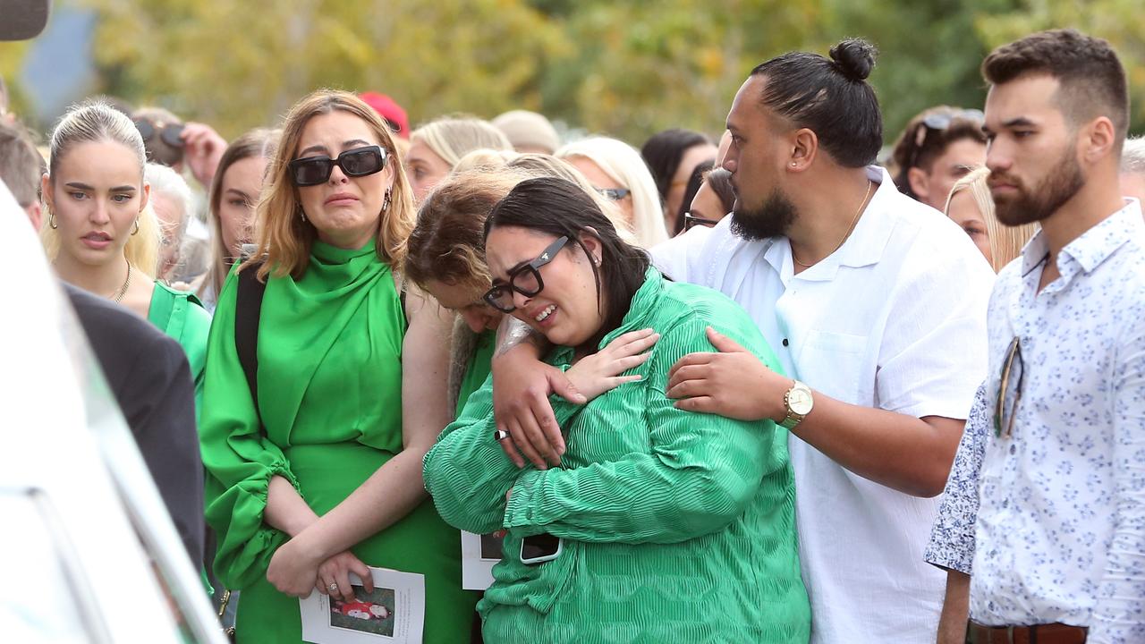 There was an outpouring of emotion when the hearse drove off. Picture: NCA NewsWire/ Richard Gosling