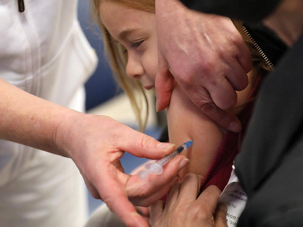 An Israeli child receives the vaccine in the city of Modiin. Picture: Gil Cohen-Magen/AFP