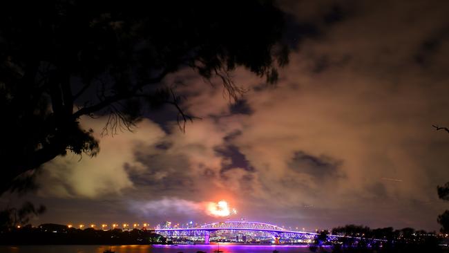 Fireworks lit up the cloudy New Zealand sky. Picture: Phil Walter/Getty 