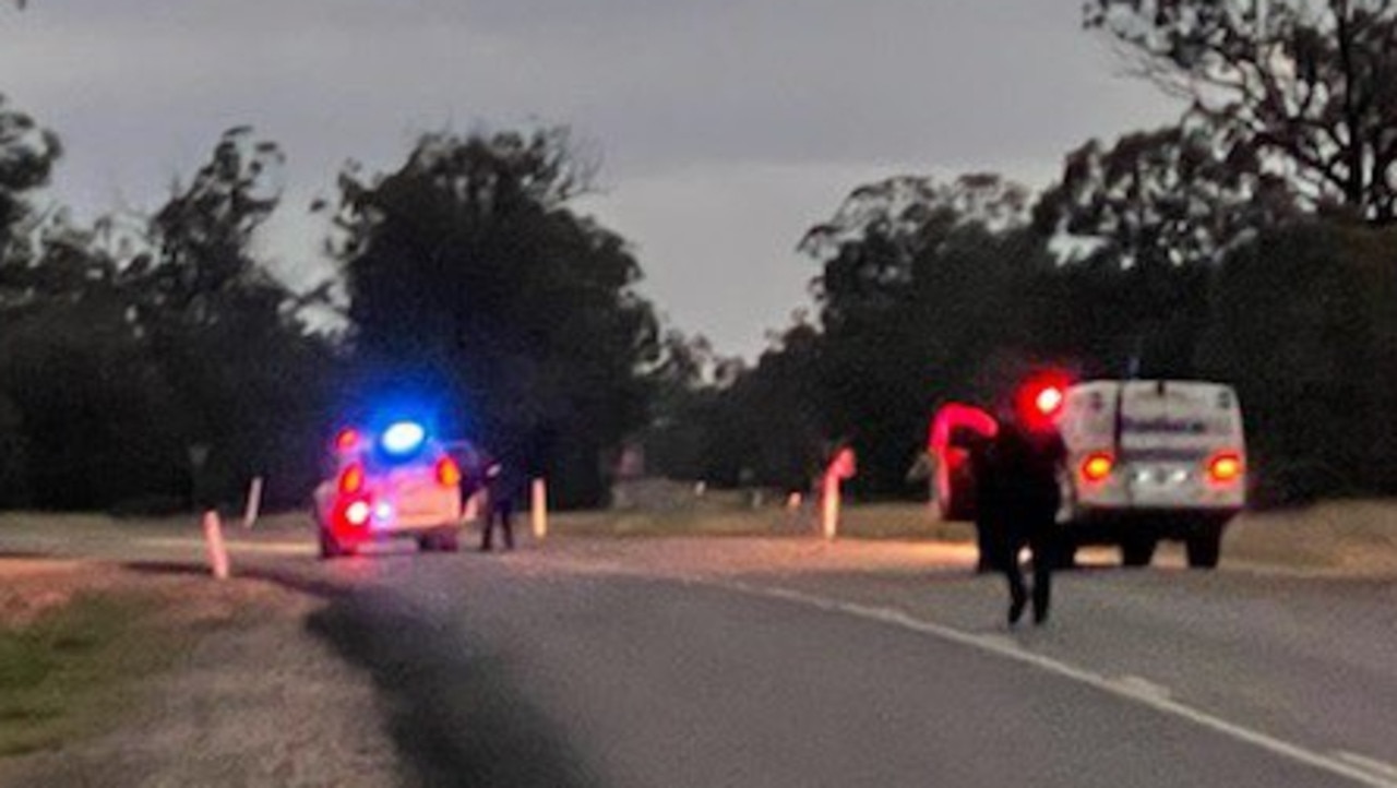 Police set up a roadblock near the Wieambilla property where two police officers were shot and killed. Picture: Emily Devon