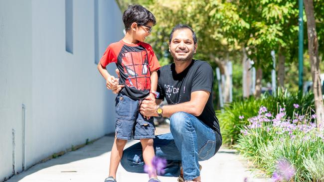 Umer Sarfraz and his son Noah, who will be starting Year 1 at the new Box Hill Public School this year. Noah’s parents have safety concerns about the roads around the school. Picture: Thomas Lisson