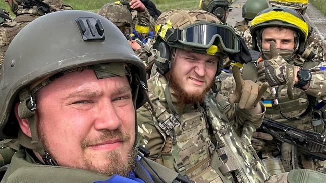 Members of the Russian Volunteer Corps on an armoured vehicle at the Graivoron border crossing in Russia’s Belgorod region Russian. Picture: Russian Volunteer Corps via Reuters