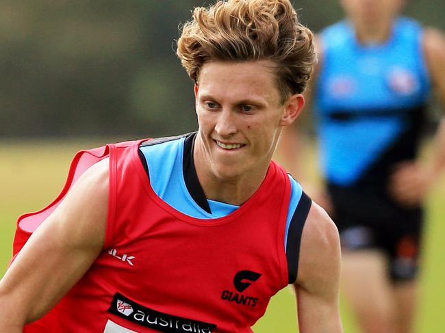 Adam Kennedy , left, and Lachie Whitfield during GWS Giants training at their Sydney Olympic Park base. pic Mark Evans