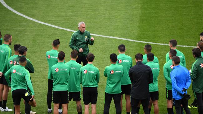 Australian coach Head Coach Bert van Marwijk speaks to the players during a training session at the Socceroos training base, Stadium Trudovye Rezervy, in the lead up to their opening match against France at the FIFA 2018 World Cup in Kazan, Russia, Wednesday, June 13, 2018. (AAP Image/Dean Lewins) NO ARCHIVING