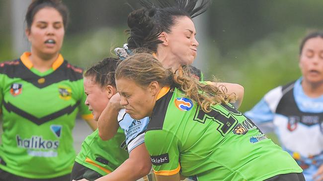 Northern Sharks star Ayesha Kay is wrapped up in a tackle when playing Palmerston Raiders in Round 1 of the 2023 NRL NT season. Picture: Pema Tamang Pakhrin