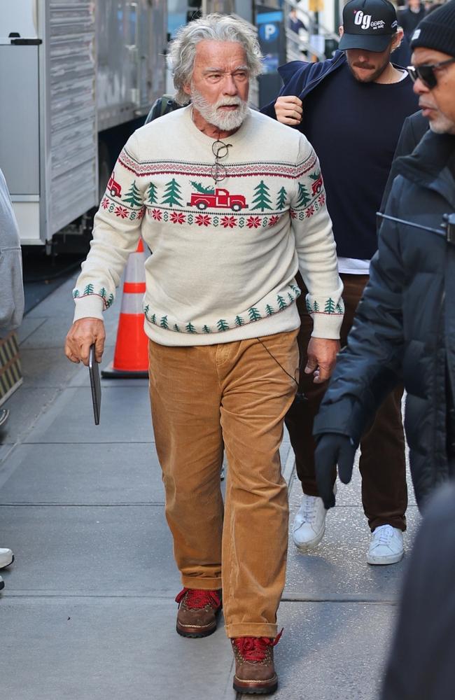 Arnold Schwarzenegger debuts his Santa Claus look on the Manhattan set of ‘The Man with the Bag’. Picture: T.JACKSON / BACKGRID