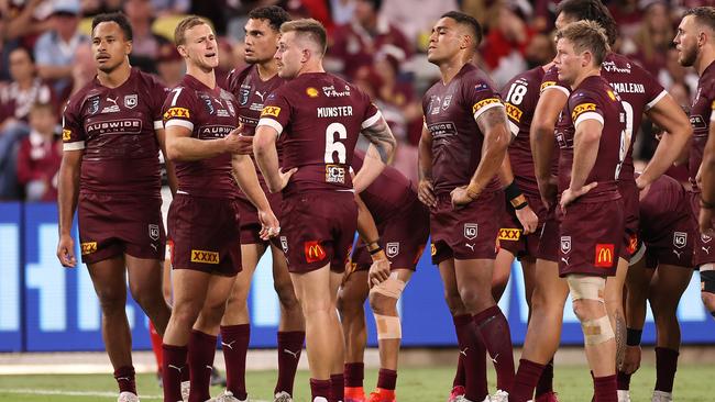 Maroons players look on after a Blues try. (Photo by Mark Kolbe/Getty Images)