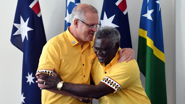 Scott Morrison greets Solomon Islands PM Manasseh Sogavare at Pacific Islands Forum in Tuvalu in 2019. Picture: AAP