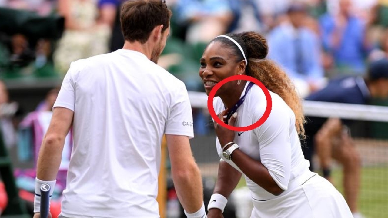 Serena Williams walked onto court with her accreditation around her neck.