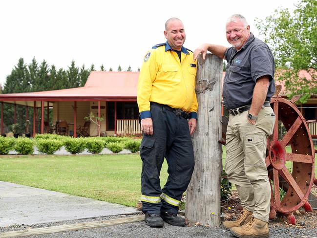 Mr Elyes and Mr Duggan have now become friends and have had plenty of “private debriefs” at the home Mr Eyles saved. Picture: Tim Hunter.