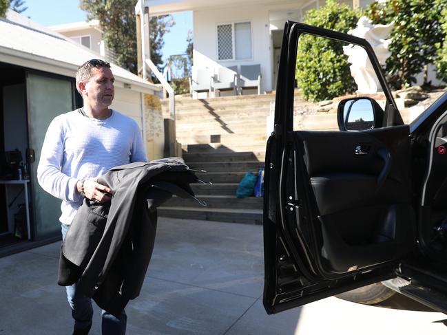 Chris Rodgers and family from Ocean View Dr moving their belongings out. Picture John Grainger