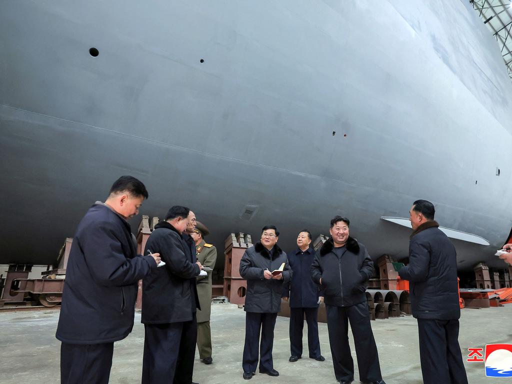 North Korean leader Kim Jong-un (C) inspecting a shipbuilding project at a major shipyard at an undisclosed location in North Korea. Picture: KCNA VIA KNS/AFP