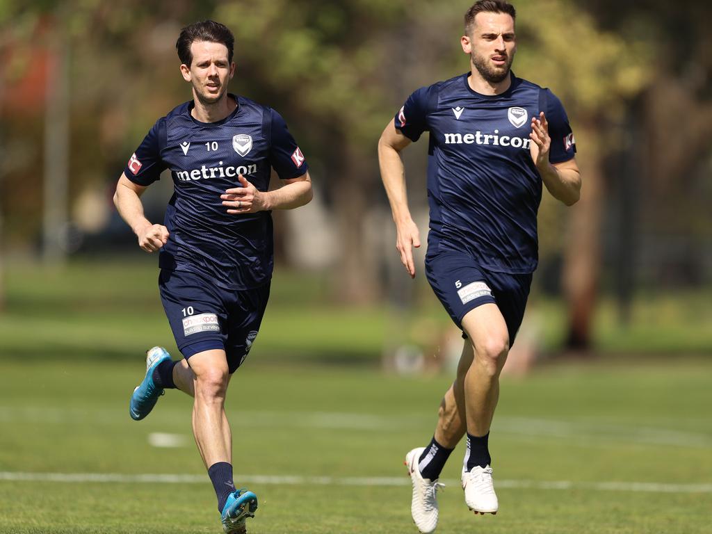 Spiranovic (R) and fellow Melbourne Victory veteran Robbie Kruse (L). Picture: Robert Cianflone/Getty Images