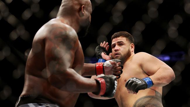 Tai Tuivasa on his way to upsetting Derrick Lewis at UFC 271 in February. Carmen Mandato/Getty Images/AFP