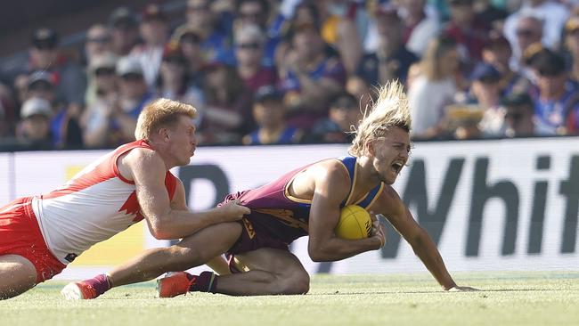 Brisbane's Kai Lohmann injures his ankle during the AFL Round 1 match between the Sydney Swans and Brisbane Lions at the SCG on March 15, 2025. Picture: Phil Hillyard