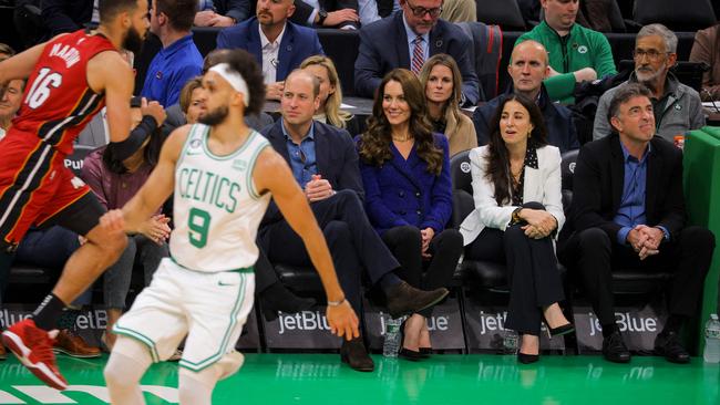 Mayor of Boston Michelle Wu, Governor-elect Maura Healey, Britain's Prince William, Catherine, Princess of Wales, Emilia Fazzalari and her husband Celtics owner Wyc Grousebeck watch the National Basketball Association game between the Boston Celtics and the Miami Heat at TD Garden in downtown Boston,on November 30, 2022. (Photo by BRIAN SNYDER / POOL / AFP)