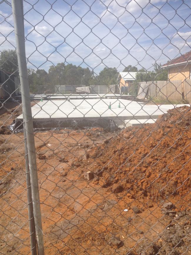 The concrete slabs left abandoned on the Hair St, Fawnker property.