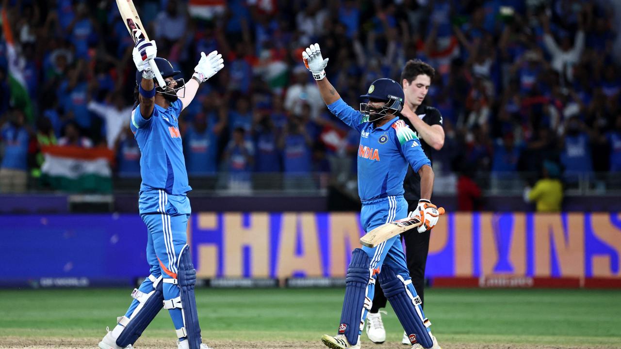 KL Rahul (L) and Ravindra Jadeja celebrate their victory. Photo by FADEL SENNA / AFP.