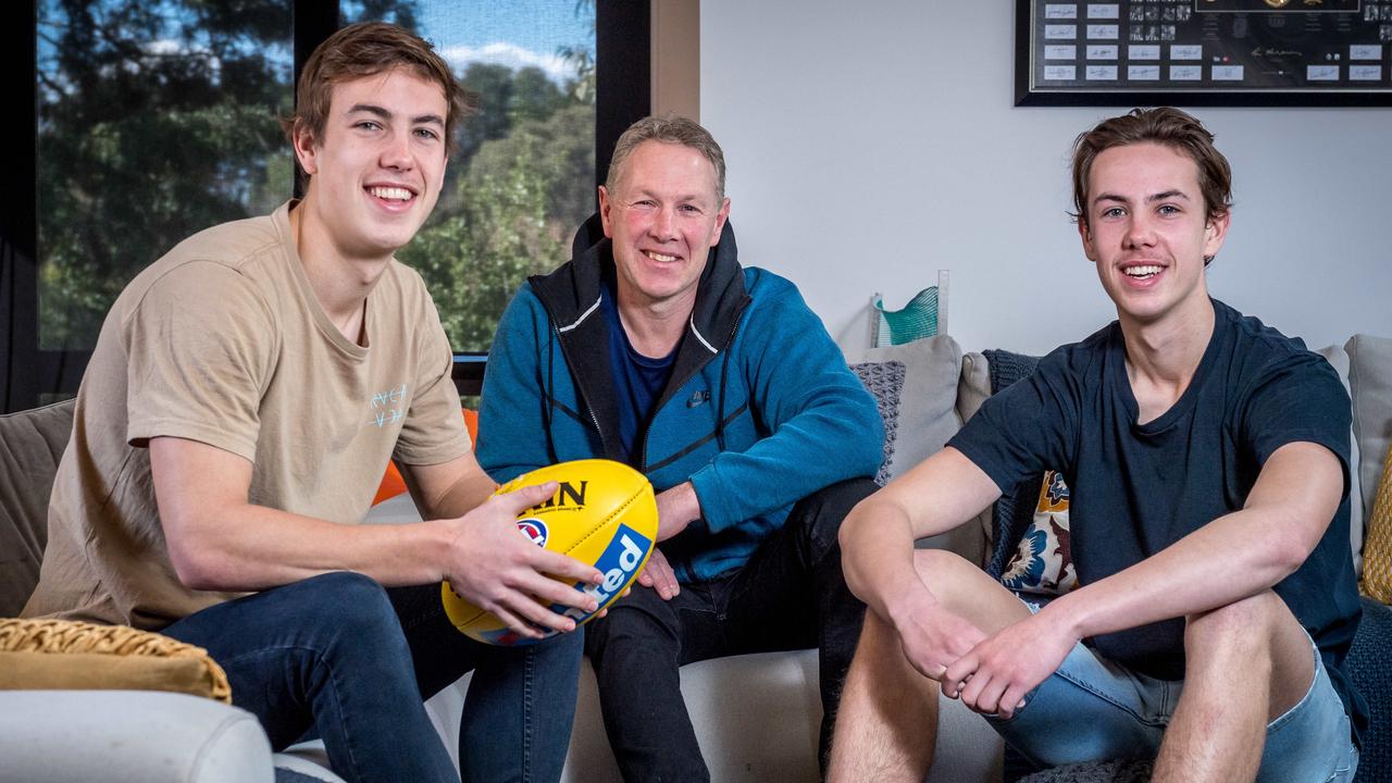 Collingwood brothers Callum and Tyler Brown at home with Pies premiership player and dad Gavin. Picture: Jake Nowakowski