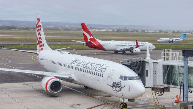 ADELAIDE, AUSTRALIA - NewsWire Photos SEPTEMBER 22, 2021: Virgin, Qantas and Cobham aircraft at Adelaide Airport. Picture: NCA NewsWire /Brenton Edwards