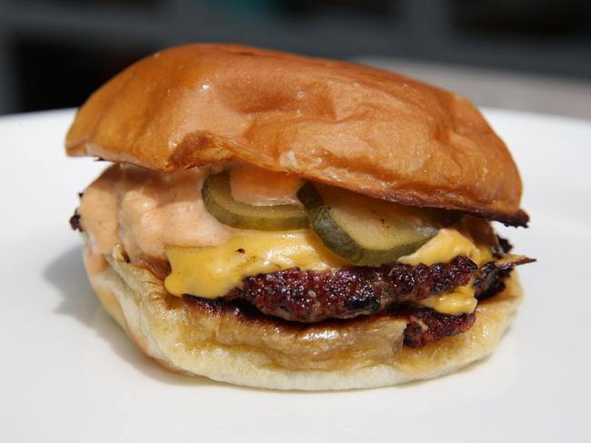 Grant Lawn’s Double cheese burger will be selling fast at The Annandale Hotel in February. Picture: Craig Wilson