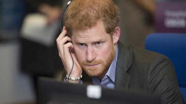 NORCROSS, ENGLAND - OCTOBER 23:  Prince Harry answers calls from veterans in the call centre during his visit to Veterans UK to mark the 25th anniversary of the Veterans UK Helpline Service on October 23, 2017 in Norcross, England.  (Photo by Andy Stenning - WPA Pool/Getty Images)