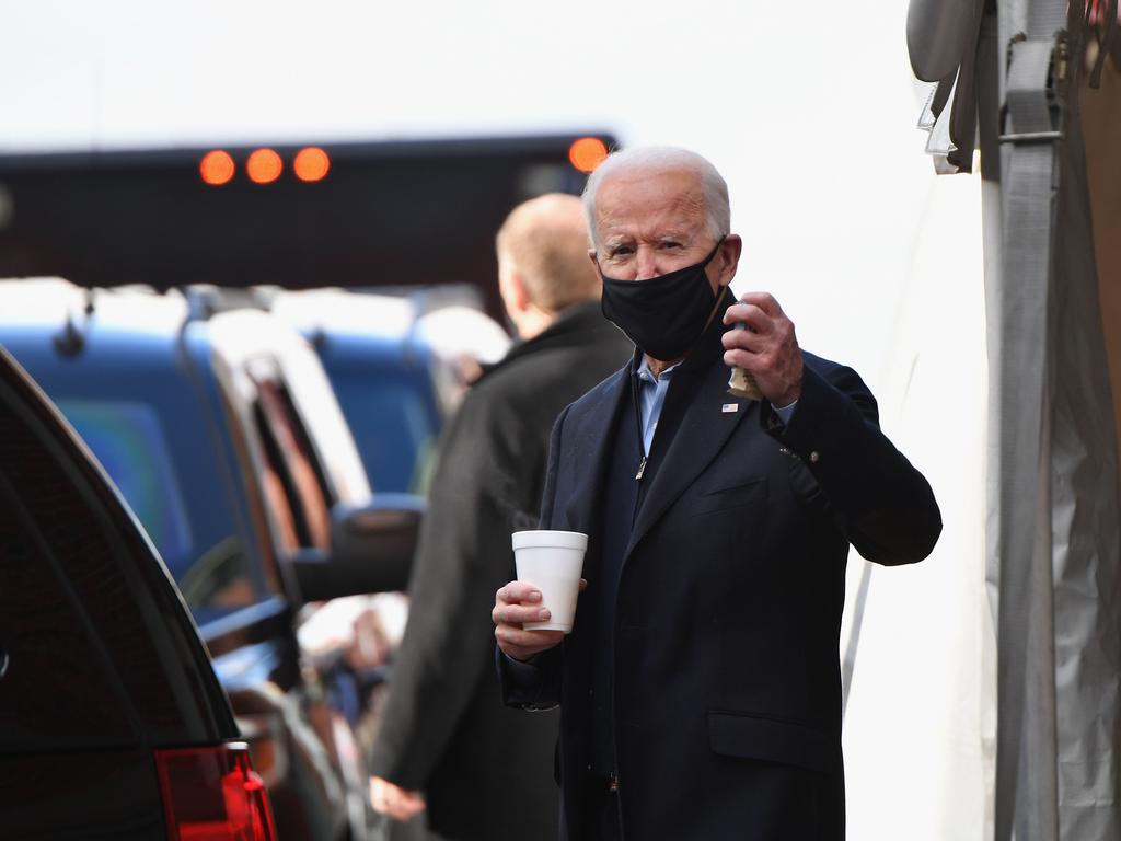 US President-elect Joe Biden leaves after meeting with transition advisers at The Queen theatre in Wilmington, Delaware. Picture: AFP