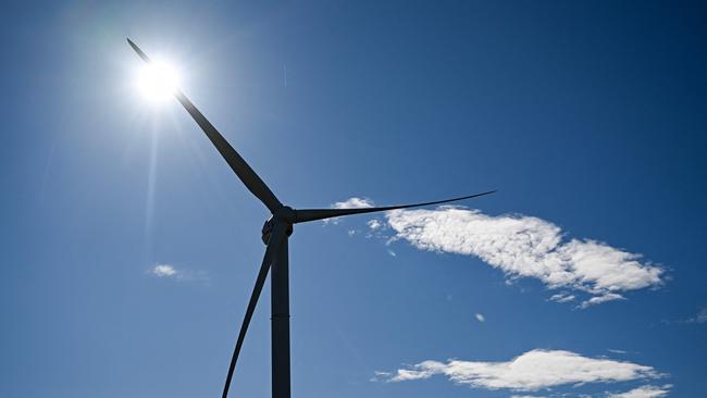 This photograph shows a wind turbine generator of a windfarm in Aumelas, west of Montpellier on March 12, 2025. Simon Popy, prÃ©sident de France Nature Environnement is suing EDF Renouvelables for the exploitation of wind turbines in a Natura 2000 area, which destroy kestrel falcons while this bird species is protected. (Photo by GABRIEL BOUYS / AFP)