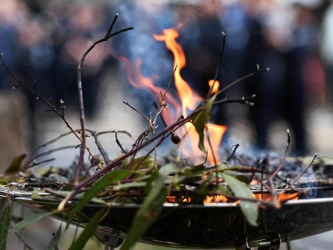 ADELAIDE, AUSTRALIA - NCA NewsWire photos - May 27, 2022. A smoking ceremony is held out the front of the South Australian Police Headquarters to launch National Reconciliation Week. Picture: NCA NewsWire / Tricia Watkinson