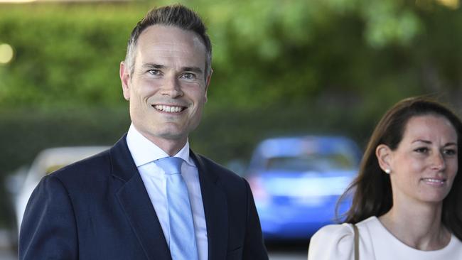 Tim James and his wife arrive at North Sydney Leagues Club on Monday.