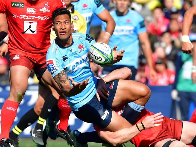 Israel Folau passes the ball against the Sunwolves on Saturday. Picture: Getty Images