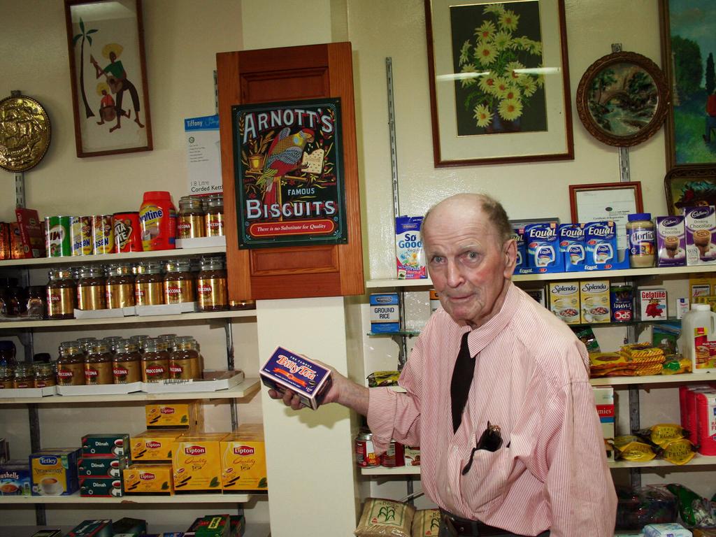 Murder victim Frank Newbery in his store. Picture: Ron Morrison.