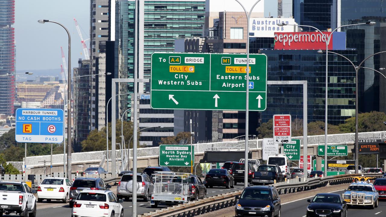 Motorist driving towards the Harbour Tunnel and Bridge toll at North Sydney. Picture: Jonathan Ng