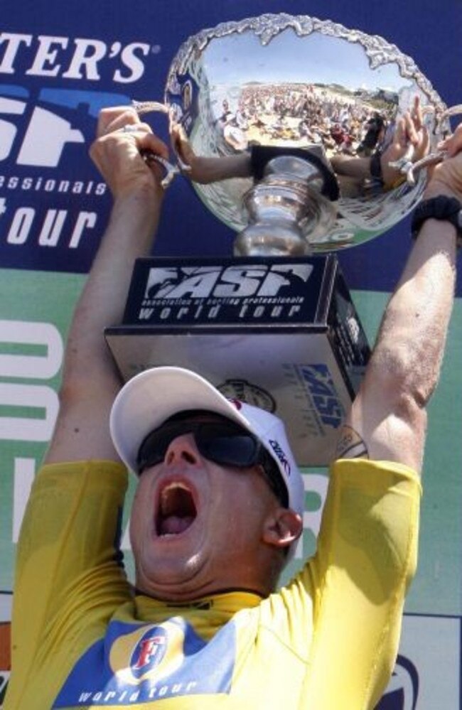 Australia's Mick Fanning celebrates after winning the Foster's Association of Surfing Professionals (ASP) world title in Imbituba, Brazil, Tuesday, Nov. 6, 2007.