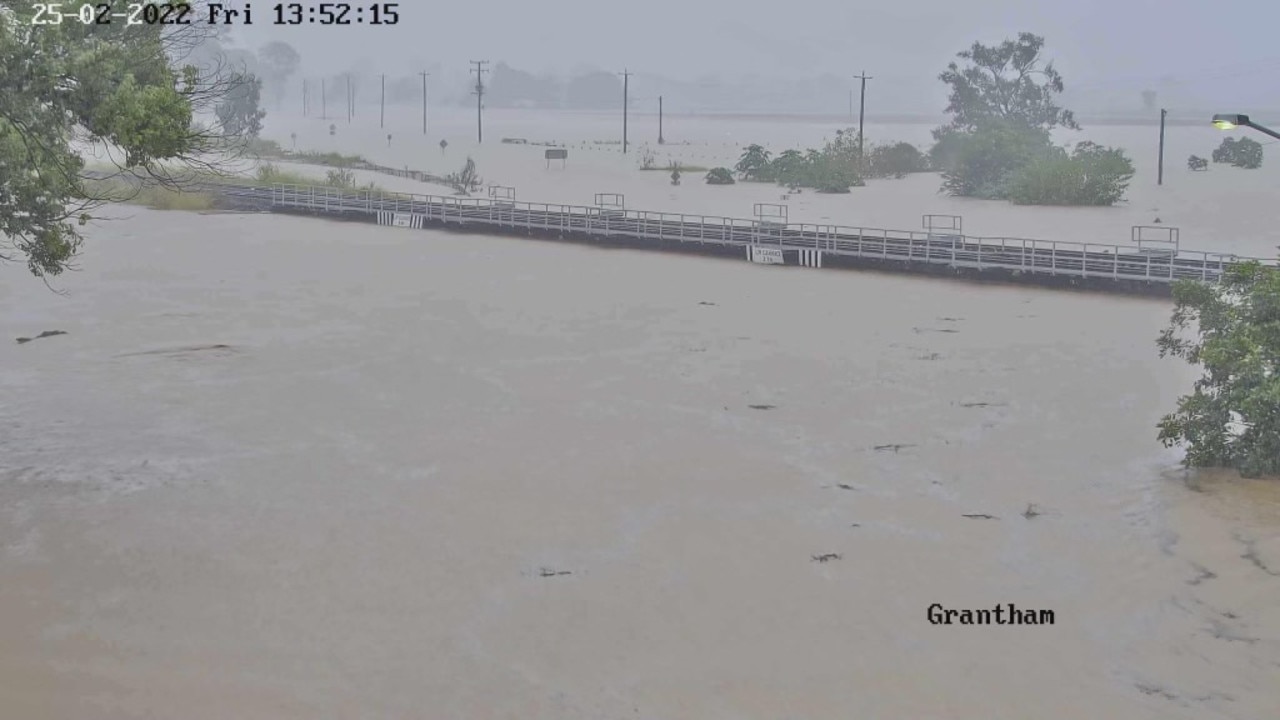 Floodwaters have reached the the railway bridge in Grantham, Lockyer Valley.