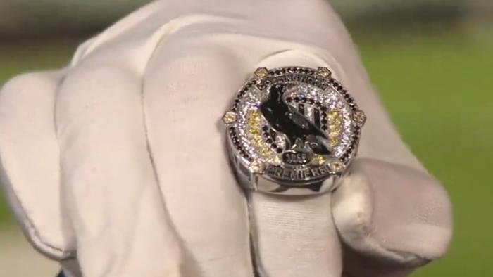 A prototype of Collingwood's 2023 premiership ring.