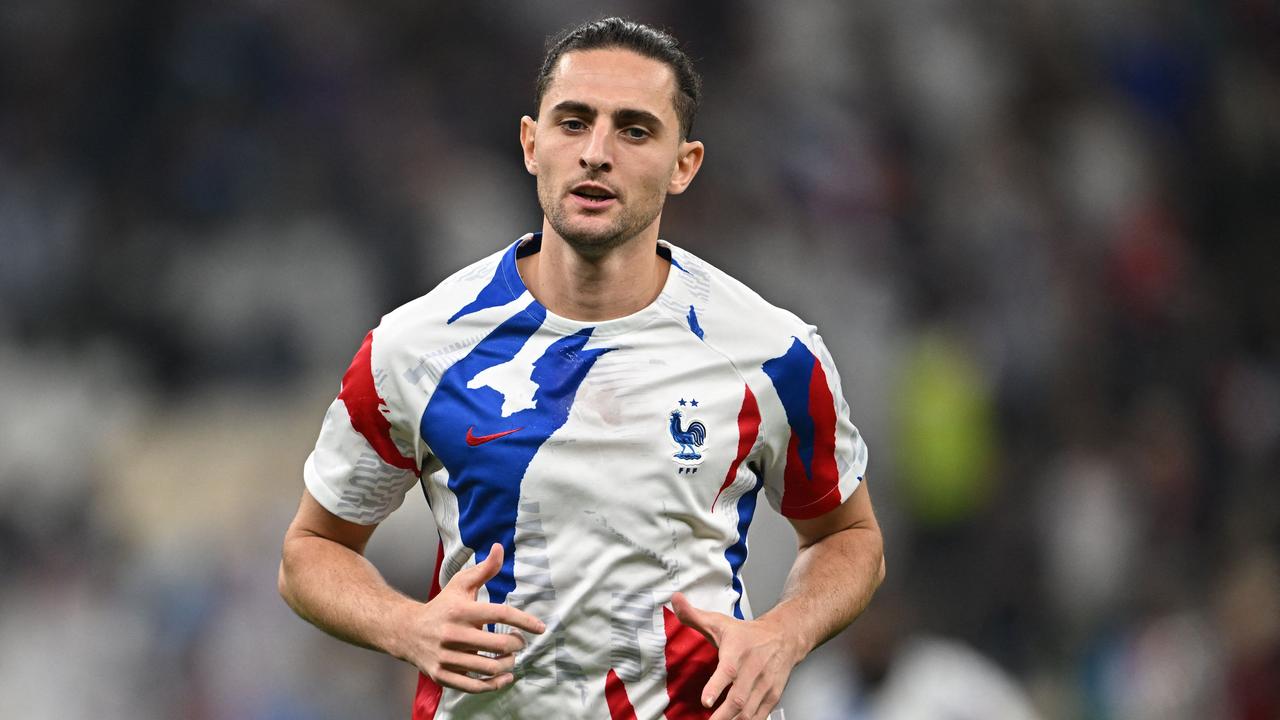 France's midfielder #14 Adrien Rabiot warms up ahead of the Qatar 2022 World Cup final football match between Argentina and France at Lusail Stadium in Lusail, north of Doha on December 18, 2022. (Photo by Paul ELLIS / AFP)