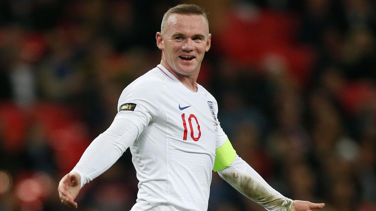 Former England skipper Wayne Rooney has said he’s interested in a charity boxing bout. (Photo by Ian KINGTON / AFP)