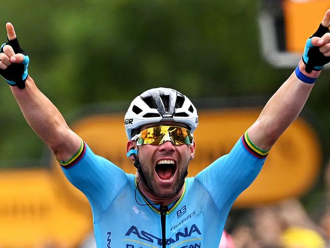 SAINT VULBAS, FRANCE - JULY 03: (EDITOR'S NOTE: Alternate crop) Mark Cavendish of The United Kingdom and Astana Qazaqstan Team celebrates at finish line as stage winner during the 111th Tour de France 2024, Stage 5 a 177.4km stage from Saint-Jean-de-Maurienne to Saint Vulbas / #UCIWT / on July 03, 2024 in Saint Vulbas, France. (Photo by Dario Belingheri/Getty Images)