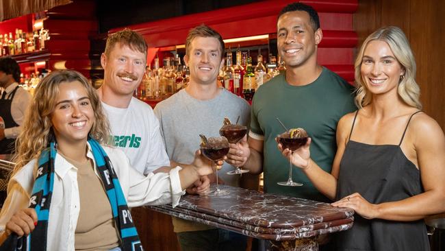 Layan Saadeh, Mason Ellis, PJ van Gyen and Bek Simpson in Adelaide, ahead of the AFL's new Gather Round event. Picture: James Elsby